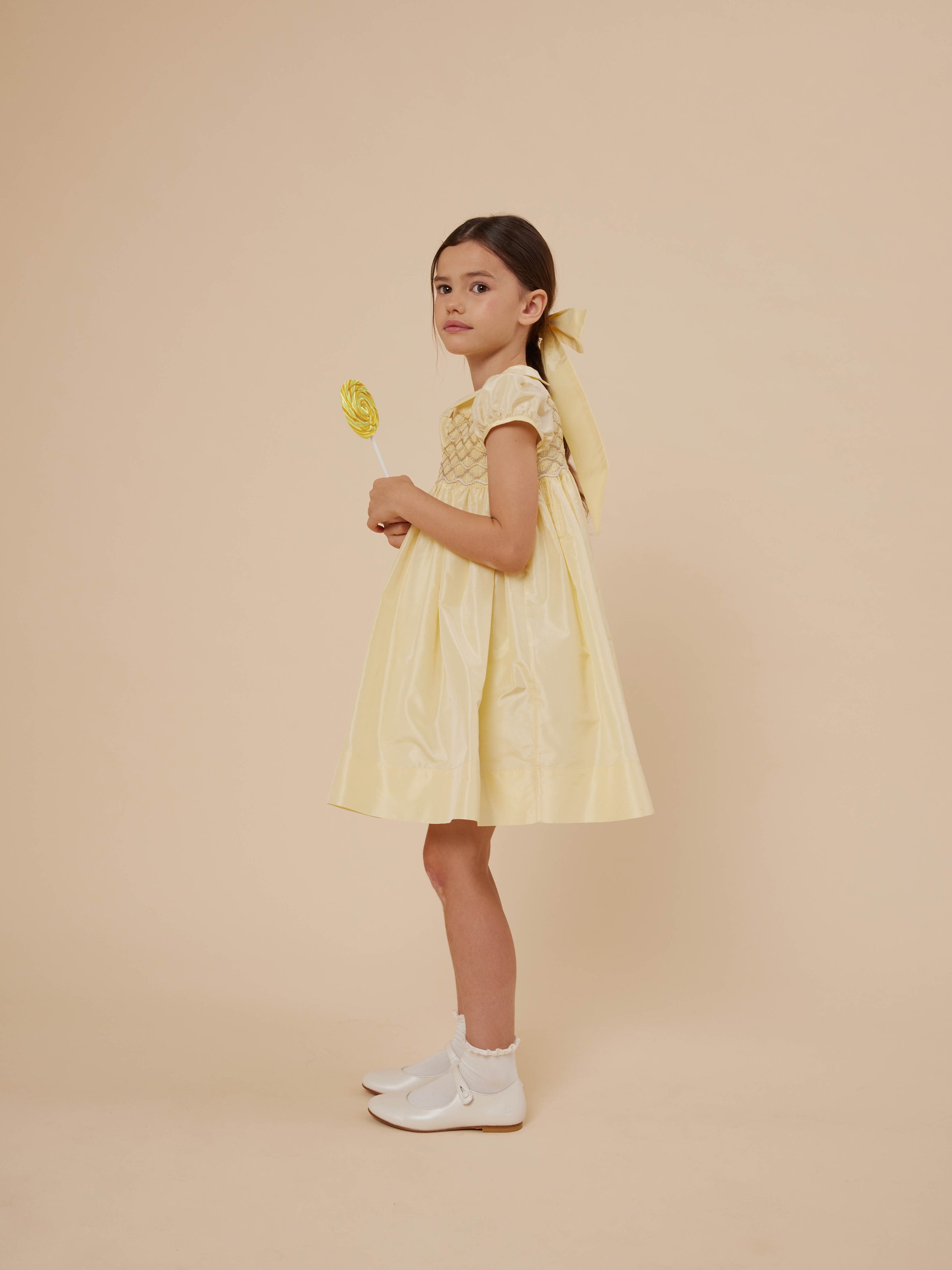 Summer 2024 girl's look yellow silk taffeta dress