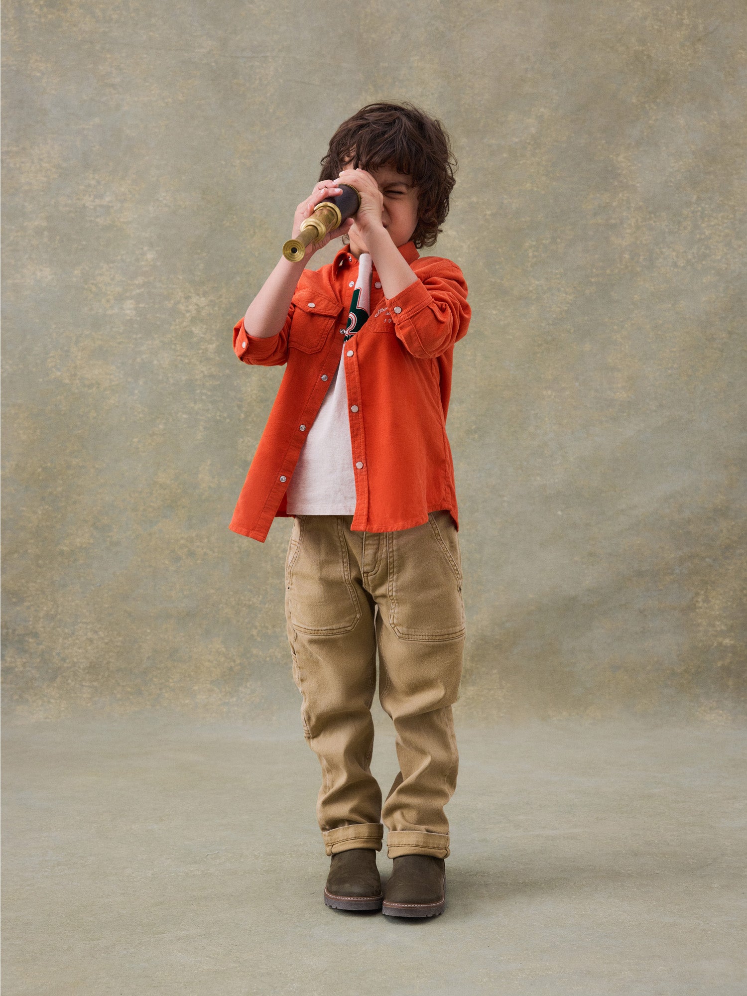 Winter 2024 boy s look orange button down shirt Bonpoint