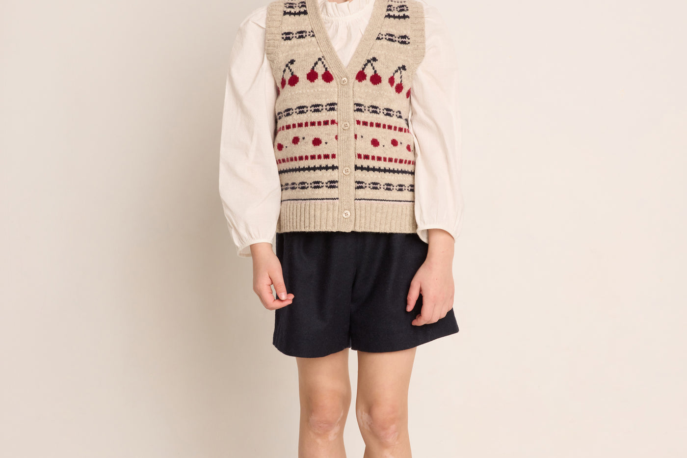 Look fille hiver 2023 cardigan sans manches