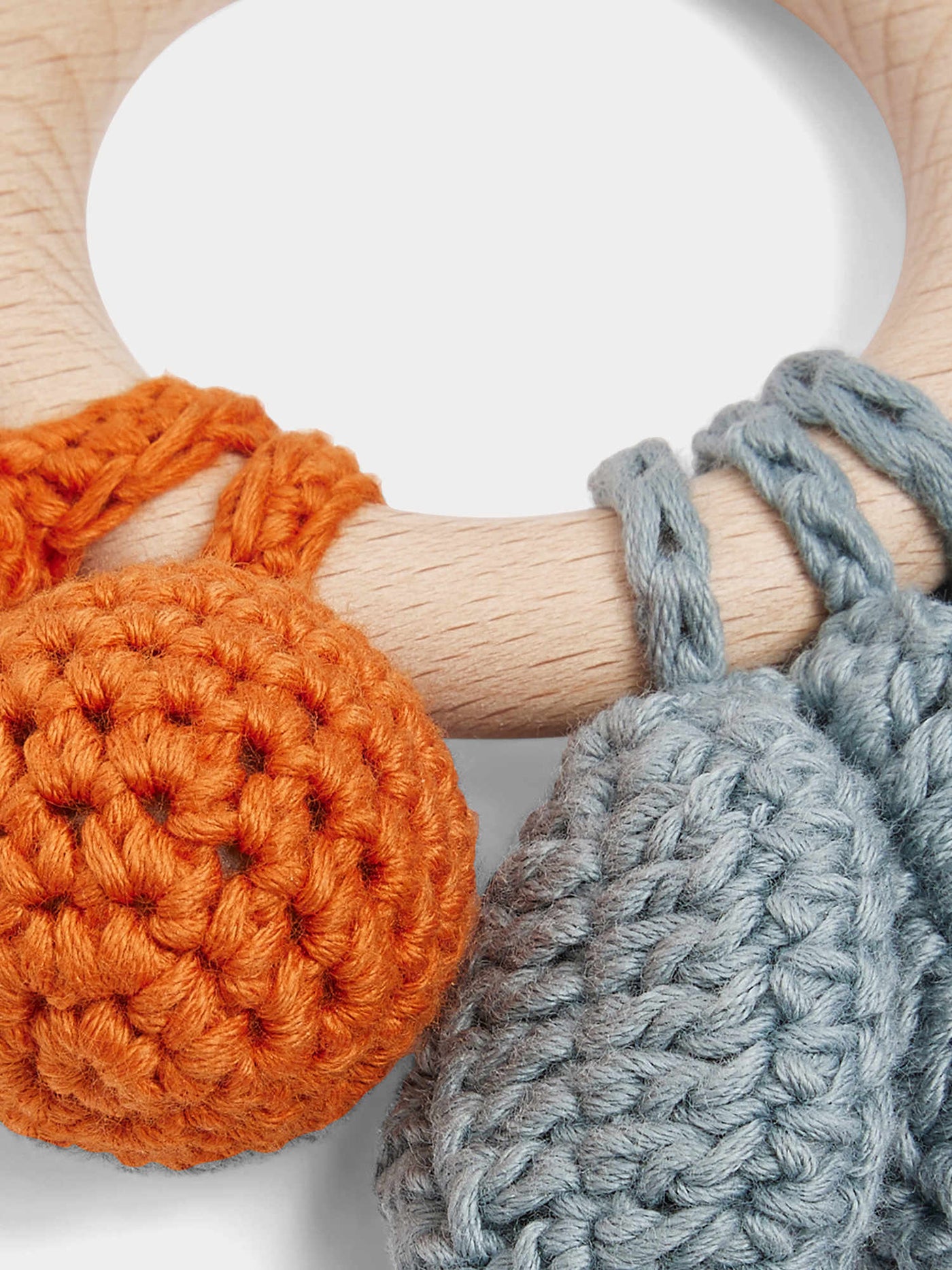 Becherrymini rattle in orange knit